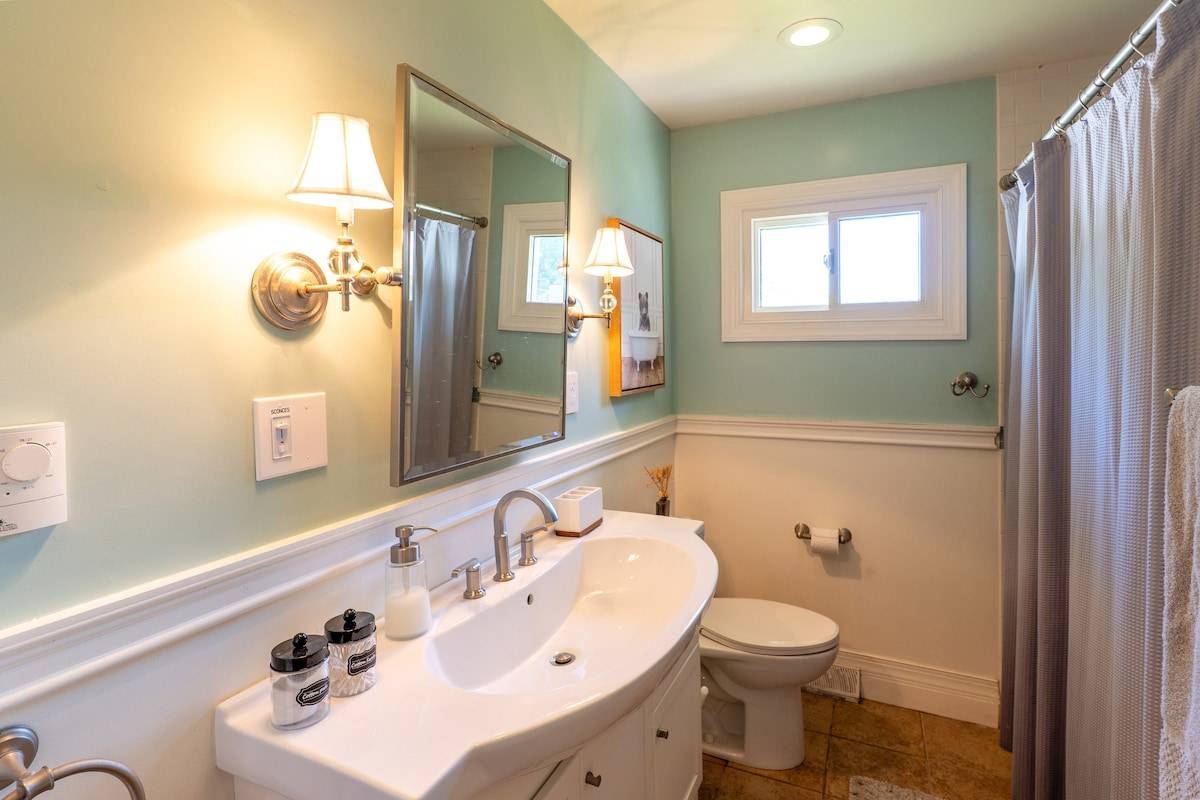 Full bathroom with tub and shower