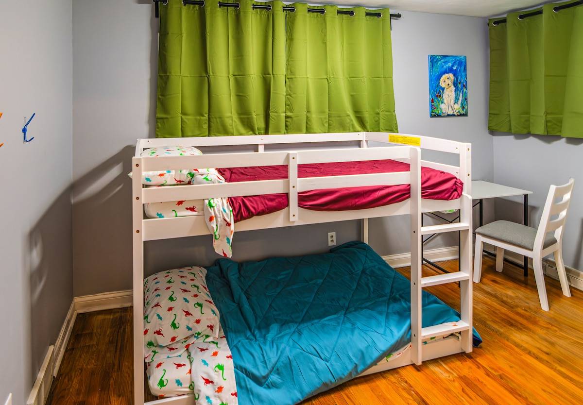 The kids' bunk room: twin-over-twin bunk bed and a project table