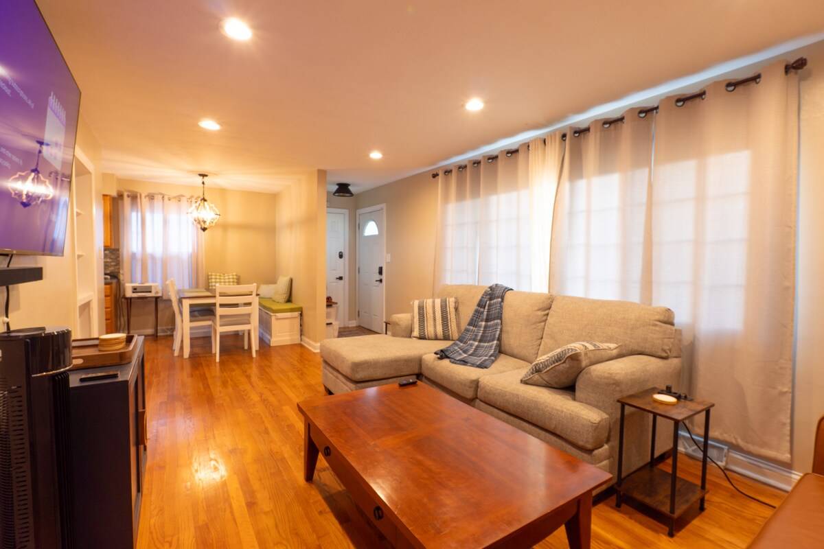 The main floor: living room open through to the dining area and front door